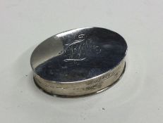 A large oval Georgian silver snuff box with engrav