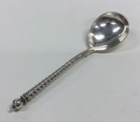 A heavy large Russian silver spoon with twisted ha