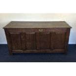 A Georgian oak hinged top coffer. Est. £60 - £80.