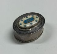 A Swedish oval silver box with enamel and ivory de