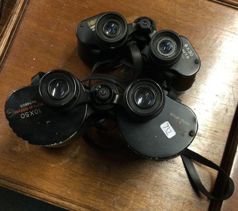 Two pairs of cased binoculars. Est. £20 - £30.