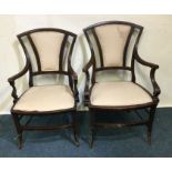 A pair of inlaid chairs with pink upholstered seat