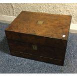 A burr walnut hinged top jewellery box. Est. £30 -