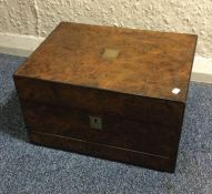 A burr walnut hinged top jewellery box. Est. £30 -
