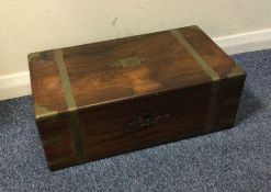 A brass and rosewood veneered travelling writing s