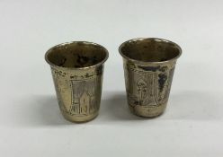 A pair of heavy silver gilt tapering goblets. Appr