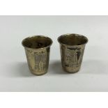 A pair of heavy silver gilt tapering goblets. Appr