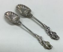 A good pair of cast silver spoons with crested ter