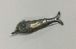 A small Continental silver figure of a fish with a