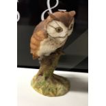 An Aynsley figure of an owl. Est. £10 - £20.