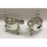 A good pair of Georgian silver sauce boats with ga