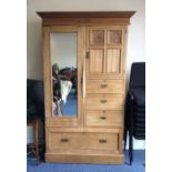 A satinwood four drawer compactum wardrobe. Est. £