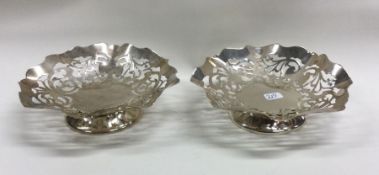 A pair of Edwardian silver pierced baskets. Birmin