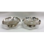 A pair of Edwardian silver pierced baskets. Birmin