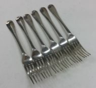 A matched set of six silver table forks. London. B