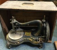 A cased Jones manual sewing machine. Est. £30 - £5