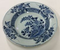 A Chinese Nanking blue and white shallow dish deco