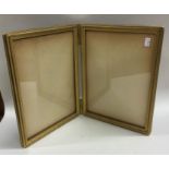 A good Antique brass mounted double fold picture f