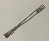 A large tapering silver pickle fork of Old English