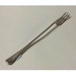 A large tapering silver pickle fork of Old English
