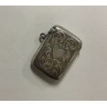 A hinged silver engraved vesta case. Birmingham. B