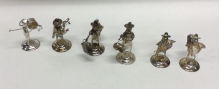 A set of six Chinese figures on circular bases. Ap