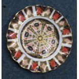 A Royal Crown Derby plate of shaped form. Pattern