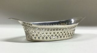 An Edwardian silver boat shaped dish with pierced