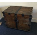 An Antique oak and cast iron mounted plate chest.