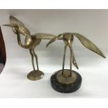 A matched pair of brass birds of Japanese design.