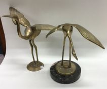 A matched pair of brass birds of Japanese design.