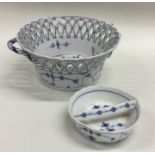 A Continental blue and white pottery basket togeth