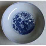 A blue and white porcelain bowl with Daoguang mark to base.