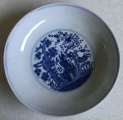 A blue and white porcelain bowl with Daoguang mark to base.