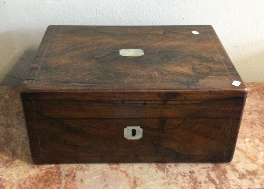 A mahogany inlaid writing box together with a dome