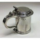 A rare Queen Anne silver flat top lidded tankard w