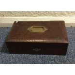 A good quality leopard skin box with fitted interi