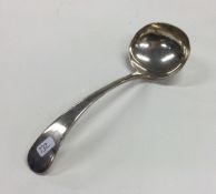 An Edwardian silver sauce ladle. Sheffield. Approx