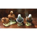 Two Beswick figures of pigeons together with two g