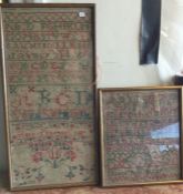 A group of four framed and glazed samplers. Est. £