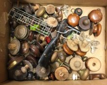 A box containing old wooden and other knobs. Est.