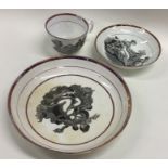 An Antique pottery plate together with matching cu