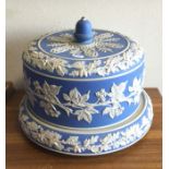 A large Wedgwood blue and white cheese dome and st