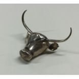 An unusual silver figure of a bull's head. Approx.