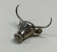 An unusual silver figure of a bull's head. Approx.