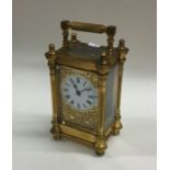 A rectangular brass mounted carriage clock of turn