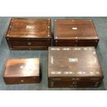 A group of four rosewood inlaid caddies. Est. £30