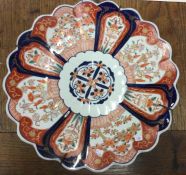 A large Chinese Imari wall charger decorated in br