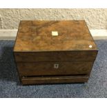 A boxed burr walnut jewellery case with fitted int