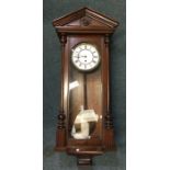 A Vienna Regulator mahogany cased wall clock. Est.